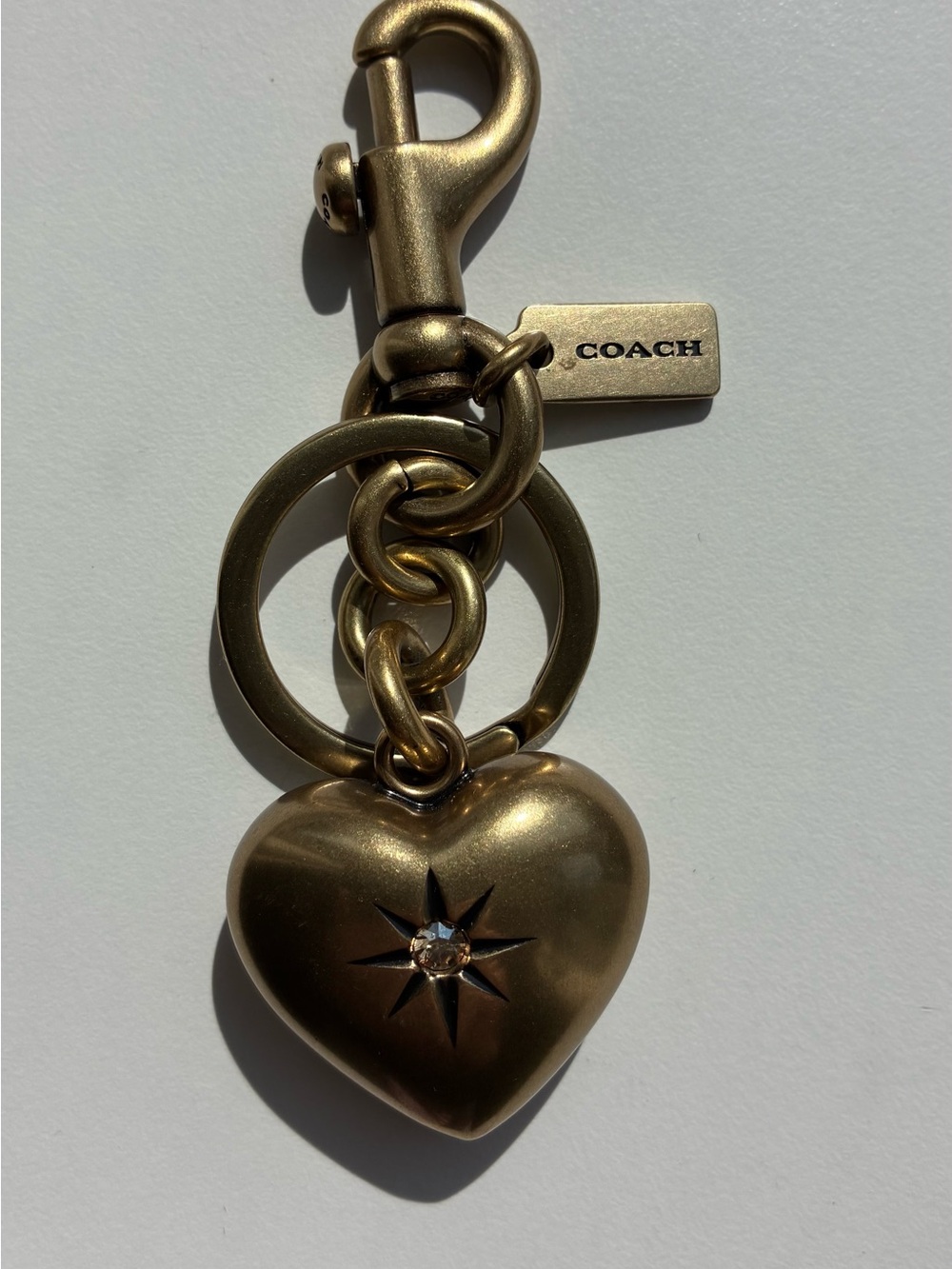 Coach Gold Heart Charm Keychain with Star-Cut Detail